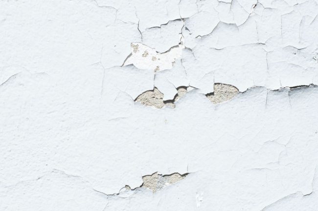 Wear and Tear of Painwork on a Wall Due to Dampness